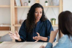 Black business woman with white woman 